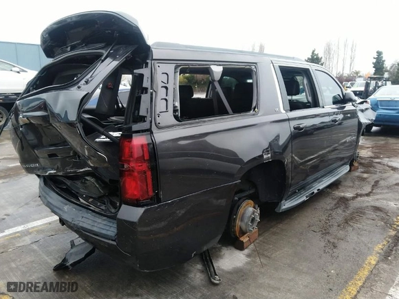 2015 Chevrolet Suburban LT with VIN 1GNSCJKC5FR717003, listed as a IAAI auction lot 38529253 with NaN miles. Bid and sale history available at carsss.com. Image 4.