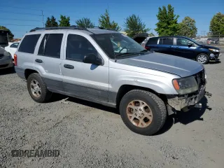 2004 Jeep Grand Cherokee Laredo with VIN 1J4GW48S54C103651, listed as a Copart auction lot 62972615 with 188,000 mi miles and Clean title. Bid and sale history available at DreamBid. Image 4.