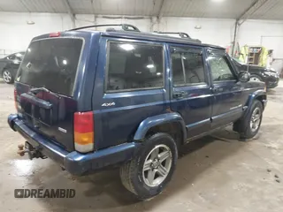 2000 Jeep Cherokee Classic with VIN 1J4FF58SXYL142372, listed as a IAAI auction lot 41820743 with 131,526 mi miles. Bid and sale history available at carsss.com. Image 4.