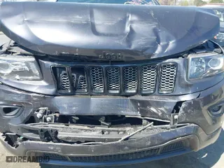 2015 Jeep Grand Cherokee Altitude with VIN 1C4RJFAG8FC954649, listed as a IAAI auction lot 41906591 with 76,804 mi miles. Bid and sale history available at carsss.com. Image 6.