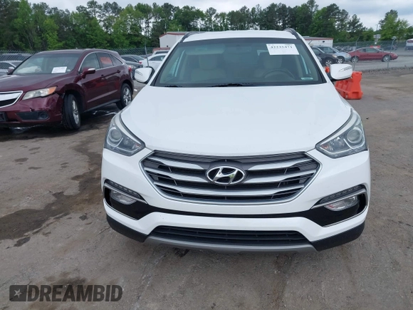 2018 Hyundai Santa Fe 2.4L z VIN 5XYZUDLB1JG543837, wystawiony jako IAAI lot #42235471 z przebiegiem 157 909 mil mil oraz . Historia ofert i sprzedaży dostępna na DreamBid. Obrazek 12.