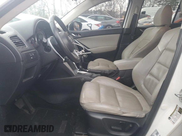 2015 Mazda CX-5 Grand Touring with VIN JM3KE2DY6F0504784, listed as a Copart auction lot 47671705 with 174,682 mi miles and Salvage Title. Bid and sale history available at carsss.com. Image 7.