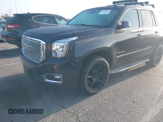 2015 GMC Yukon Denali z VIN 1GKS1CKJ7FR566419, wystawiony jako IAAI lot #41948825 z przebiegiem 235 037 mil mil oraz . Historia ofert i sprzedaży dostępna na DreamBid. Obrazek 6.