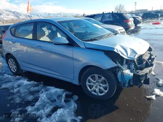 2014 Hyundai Accent GS with VIN KMHCT5AE8EU145312, listed as a IAAI auction lot 41021429 with 70,835 mi miles. Bid and sale history available at carsss.com. Image 1.