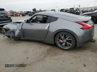 2013 Nissan 370Z with VIN JN1AZ4EH0DM384010, listed as a Copart auction lot 77851724 with 79,101 mi miles and Salvage Title. Bid and sale history available at carsss.com. Image 2.