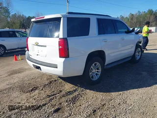 2015 Chevrolet Tahoe LT with VIN 1GNSCBKC0FR104096, listed as a IAAI auction lot 41679298 with 231,005 mi miles and . Bid and sale history available at DreamBid. Image 4.