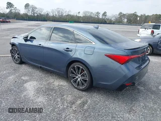 2022 Toyota Avalon Touring z VIN 4T1HZ1FB3NU088304, wystawiony jako IAAI lot #36419998 z przebiegiem 14 956 mil mil oraz . Historia ofert i sprzedaży dostępna na DreamBid. Obrazek 3.