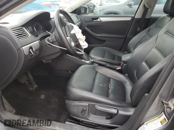 2014 Volkswagen Jetta SE with VIN 3VWD07AJ7EM363186, listed as a Copart auction lot 60873465 with 215,323 mi miles and Salvage title. Bid and sale history available at DreamBid. Image 7.