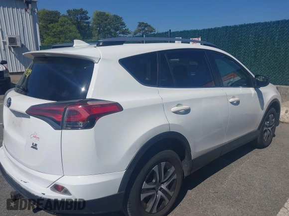 2017 Toyota RAV4 LE with VIN JTMBFREV4HJ112595, listed as a IAAI auction lot 42234289 with 207,379 mi miles and . Bid and sale history available at carsss.com. Image 13.