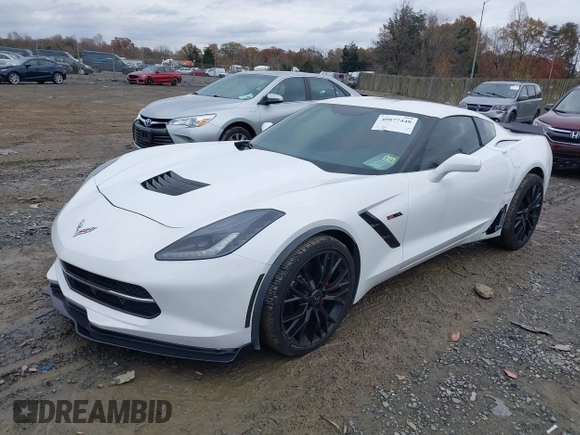 2014 Chevrolet Corvette 1LT z VIN 1G1YA2D7XE5128719, wystawiony jako IAAI lot #40877448 z przebiegiem 75 961 mil mil oraz . Historia ofert i sprzedaży dostępna na DreamBid. Obrazek 2.