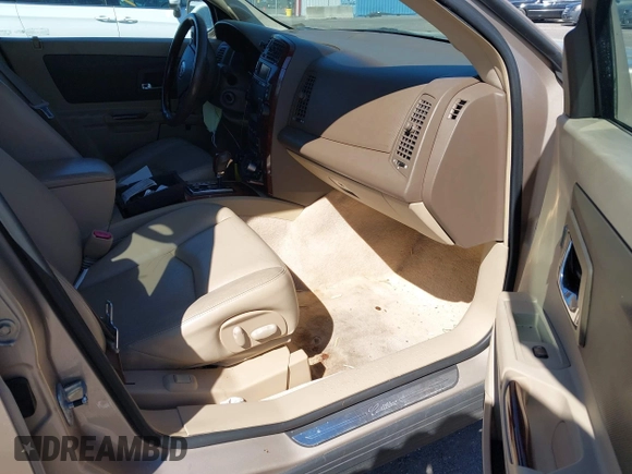 2006 Cadillac SRX z VIN 1GYEE637760197643, wystawiony jako IAAI lot #41864261 z przebiegiem 223 047 mil mil oraz . Historia ofert i sprzedaży dostępna na DreamBid. Obrazek 5.
