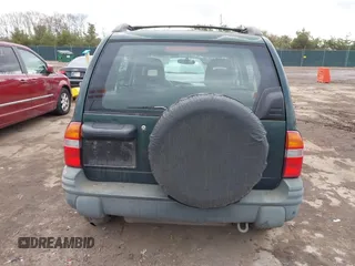 2002 Chevrolet Tracker z VIN 2CNBJ13C126946857, wystawiony jako IAAI lot #41491975 z przebiegiem Nie podano mil oraz . Historia ofert i sprzedaży dostępna na DreamBid. Obrazek 17.