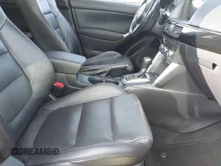 2014 Mazda CX-5 Grand Touring with VIN JM3KE4DY7E0425201, listed as a IAAI auction lot 41803597 with 118,867 mi miles. Bid and sale history available at carsss.com. Image 5.