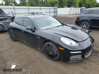 2015 Porsche Panamera 4 with VIN WP0AA2A71FL006079, listed as a Copart auction lot 68807744 with 110,356 mi miles and Salvage Title. Bid and sale history available at carsss.com. Image 4.