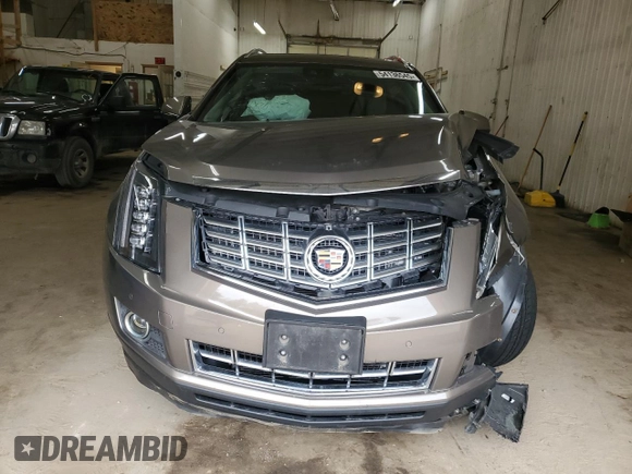 2014 Cadillac SRX Luxury Collection z VIN 3GYFNEE34ES652268, wystawiony jako Copart lot #54136545 z przebiegiem 99 542 mil mil oraz Szkoda całkowita • Salvage title. Historia ofert i sprzedaży dostępna na DreamBid. Obrazek 5.