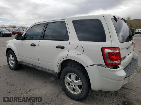 2009 Ford Escape XLS with VIN 1FMCU92749KB31140, listed as a Copart auction lot 53645705 with 213,481 mi miles and Salvage title. Bid and sale history available at DreamBid. Image 2.
