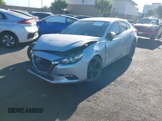 2017 Mazda 3 Touring with VIN JM1BN1V72H1106185, listed as a IAAI auction lot 42697405 with 110,324 mi miles and . Bid and sale history available at DreamBid. Image 2.