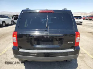 2014 Jeep Patriot Altitude with VIN 1C4NJPBA2ED851122, listed as a Copart auction lot 52588795 with 160,258 mi miles and Salvage Title. Bid and sale history available at DreamBid. Image 6.