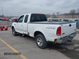 2003 Ford F-150 XL with VIN 1FTRX18L73NB72735, listed as a IAAI auction lot 42016567 with 0 mi miles. Bid and sale history available at carsss.com. Image 3.