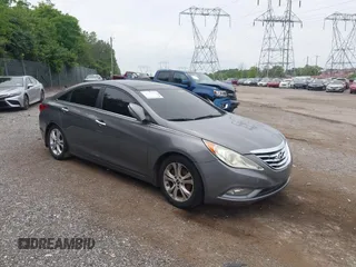 2012 Hyundai Sonata Limited z VIN 5NPEC4AC4CH437603, wystawiony jako IAAI lot #42349955 z przebiegiem 138 393 mil mil oraz . Historia ofert i sprzedaży dostępna na DreamBid. Obrazek 1.