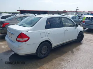 2008 Nissan Versa 1.8 S with VIN 3N1BC11E38L392277, listed as a IAAI auction lot 41927976 with 135,795 mi miles. Bid and sale history available at carsss.com. Image 4.