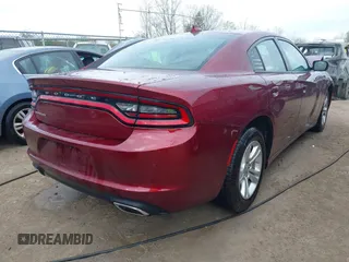 2023 Dodge Charger SXT with VIN 2C3CDXBG9PH659726, listed as a IAAI auction lot 42103636 with 14,321 mi miles and . Bid and sale history available at DreamBid. Image 4.