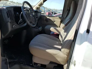 2017 Chevrolet Express Cargo Van with VIN 1GCWGBFG7H1135696, listed as a Copart auction lot 77438324 with 100,675 mi miles and Salvage Title. Bid and sale history available at carsss.com. Image 7.