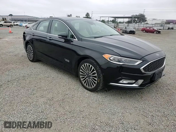 2017 Ford Fusion Titanium z VIN 3FA6P0SU5HR105415, wystawiony jako Copart lot #59779715 z przebiegiem 88 988 mil mil oraz Szkoda całkowita • Salvage title. Historia ofert i sprzedaży dostępna na DreamBid. Obrazek 13.