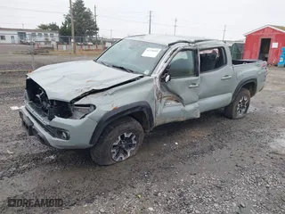 2022 Toyota Tacoma 4WD SR with VIN 3TMCZ5AN3NM528100, listed as a IAAI auction lot 41538608 with 23,917 mi miles. Bid and sale history available at carsss.com. Image 18.