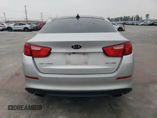 2015 Kia Optima EX z VIN 5XXGN4A71FG396076, wystawiony jako Copart lot #55306755 z przebiegiem 59 330 mil mil oraz Szkoda całkowita • Salvage title. Historia ofert i sprzedaży dostępna na DreamBid. Obrazek 6.