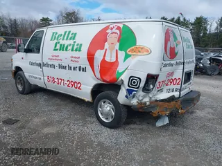 2012 Ford Econoline Cargo Commercial with VIN 1FTNE1EW6CDA93498, listed as a IAAI auction lot 42041801 with 105,555 mi miles and . Bid and sale history available at carsss.com. Image 3.
