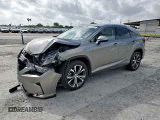 2017 Lexus RX 450h with VIN 2T2BGMCAXHC008829, listed as a Copart auction lot 61410365 with 70,463 mi miles and Salvage title. Bid and sale history available at DreamBid. Image 1.