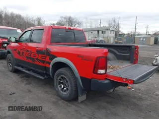 2016 Ram 1500 Rebel z VIN 1C6RR7YT3GS307866, wystawiony jako IAAI lot #42008912 z przebiegiem 65 556 mil mil oraz . Historia ofert i sprzedaży dostępna na DreamBid. Obrazek 3.