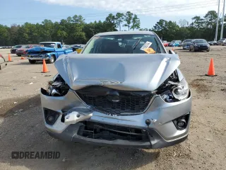 2015 Mazda CX-5 Touring with VIN JM3KE2CY7F0435914, listed as a Copart auction lot 61885704 with 0 mi miles and Salvage Title. Bid and sale history available at carsss.com. Image 5.