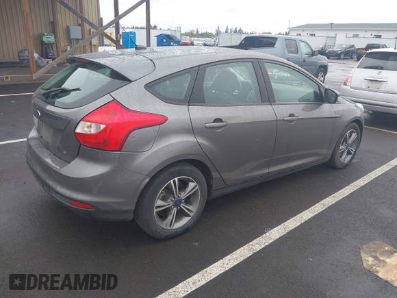 2014 Ford Focus SE with VIN 1FADP3K21EL462169, listed as a IAAI auction lot 42145524 with 100,156 mi miles. Bid and sale history available at carsss.com. Image 4.