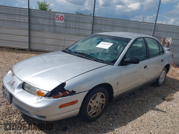 2002 Saturn SL with VIN 1G8ZF52842Z147985, listed as a IAAI auction lot 42601452 with 50,301 mi miles and . Bid and sale history available at DreamBid. Image 2.