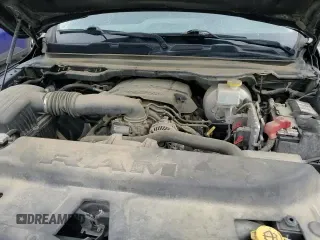 2019 Ram 1500 Tradesman z VIN 1C6SRFCT4KN662300, wystawiony jako Copart lot #52959345 z przebiegiem 133 477 mil mil oraz Szkoda całkowita • Salvage title. Historia ofert i sprzedaży dostępna na DreamBid. Obrazek 13.