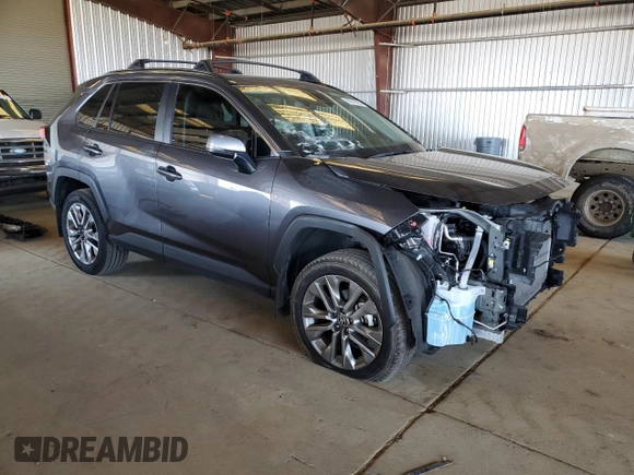 2024 Toyota RAV4 XLE Premium with VIN 2T3C1RFV3RC290066, listed as a Copart auction lot 56318665 with 28,741 mi miles and Salvage title. Bid and sale history available at DreamBid. Image 4.