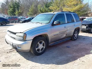 2004 Chevrolet TrailBlazer LS with VIN 1GNDT13S442119957, listed as a IAAI auction lot 41760671 with 233,032 mi miles. Bid and sale history available at carsss.com. Image 2.