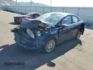 2016 Ford Fiesta Titanium z VIN 3FADP4CJ7GM157983, wystawiony jako Copart lot #75773954 z przebiegiem 149 363 mil mil oraz Szkoda całkowita • Salvage title. Historia ofert i sprzedaży dostępna na DreamBid. Obrazek 1.