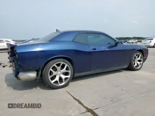 2015 Dodge Challenger SXT Plus z VIN 2C3CDZBG1FH809774, wystawiony jako Copart lot #57521245 z przebiegiem 134 614 mil mil oraz Szkoda całkowita • Salvage title. Historia ofert i sprzedaży dostępna na DreamBid. Obrazek 3.