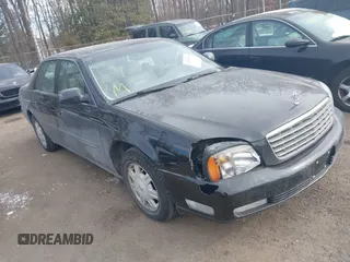 2003 Cadillac DeVille with VIN 1G6KD54Y33U292267, listed as a IAAI auction lot 41369582 with 117,636 mi miles. Bid and sale history available at carsss.com. Image 1.
