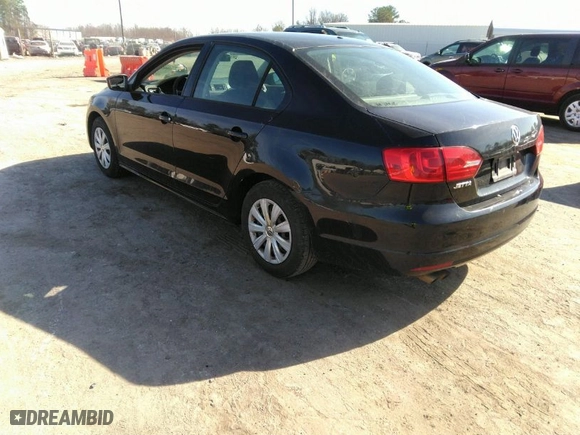 2014 Volkswagen Jetta Sedan S with VIN 3VW2K7AJ5EM310715, listed as a IAAI auction lot 41843290 with 257,801 mi miles. Bid and sale history available at carsss.com. Image 3.