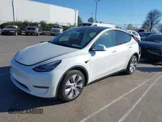 2023 Tesla Model Y Long Range with VIN 7SAYGDEE5PA094253, listed as a IAAI auction lot 41701966 with 29,458 mi miles and . Bid and sale history available at DreamBid. Image 2.
