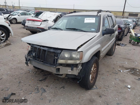 2004 Jeep Grand Cherokee Laredo with VIN 1J4GX48S44C301120, listed as a IAAI auction lot 41281556 with 267,246 mi miles. Bid and sale history available at carsss.com. Image 6.