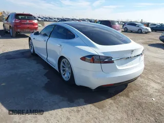 2020 Tesla Model S Long Range with VIN 5YJSA1E23LF360441, listed as a IAAI auction lot 41312865 with 68,967 mi miles and . Bid and sale history available at DreamBid. Image 3.