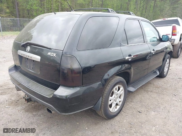 2004 Acura MDX Touring Pkg with VIN 2HNYD18624H557669, listed as a IAAI auction lot 41956830 with 211,663 mi miles. Bid and sale history available at carsss.com. Image 4.