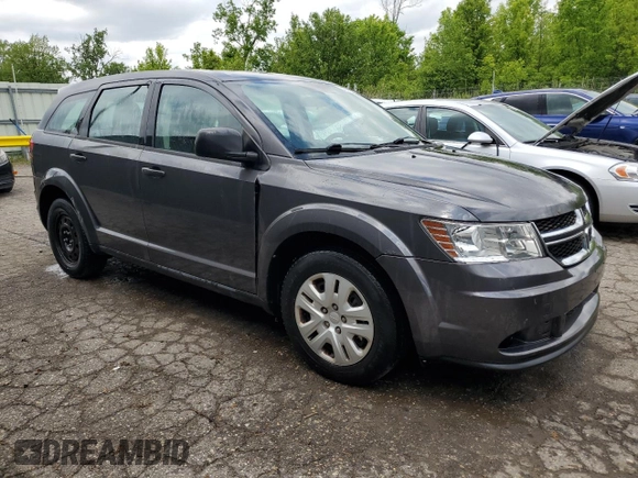 2014 Dodge Journey American Value with VIN 3C4PDCAB1ET135504, listed as a Copart auction lot 58803645 with 164,501 mi miles and Clean title. Bid and sale history available at DreamBid. Image 4.