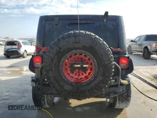 2018 Jeep Wrangler JK Unlimited Sport S with VIN 1C4BJWDG8JL812324, listed as a Copart auction lot 76595354 with 140,013 mi miles and Salvage Title. Bid and sale history available at carsss.com. Image 6.
