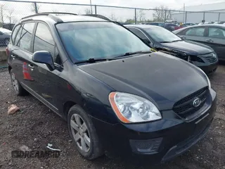 2007 Kia Rondo LX with VIN KNAFG526877096835, listed as a IAAI auction lot 42014423 with 194,412 mi miles. Bid and sale history available at carsss.com. Image 1.